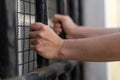 Girl stressed trapped in steel cage.The concept of violence against woman Royalty Free Stock Photo