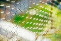 The slave`s net. Green mesh slave on a green background