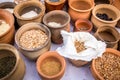 Slavic dry food products in an earthenware pots. Royalty Free Stock Photo