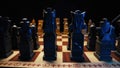 Slavic old styled chess pieces on wooden chessboard before party competition