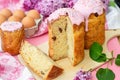 Slavic Orthodox Easter bread Kulich with raisins, nuts and pink icing