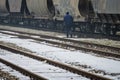 Slavonski Brod, Croatia 1/31/2019: Train station covered with snow with foggy day