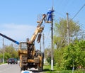 Electricians repair the power line. Workers are locksmith electricians.