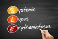 SLE - Systemic Lupus Erythematosus acronym, concept on blackboard