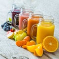Slection of fresh fruit juices in jars Royalty Free Stock Photo