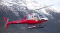 A helicopter lifting off at skagway port, alaska