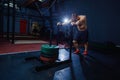 Sled push man pushing weights workout exercise at gym. Cross fit style Royalty Free Stock Photo