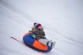 Little boy enjoying a sleigh ride Royalty Free Stock Photo