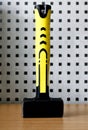 Sledge hammer with rubberized yellow handle, front view, vertica Royalty Free Stock Photo