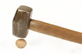 Sledge hammer and walnut Royalty Free Stock Photo