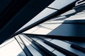 A sleek abstract background with charcoal gray, black, and silver, featuring geometric lines and