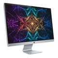 A sleek Apple iMac is displayed, featuring a high-resolution screen. The screen shows Royalty Free Stock Photo