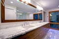 Sleek bathroom with double vanity cabinet