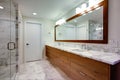 Sleek bathroom with double vanity cabinet