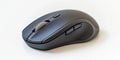 A sleek black computer mouse sits elegantly on a clean background. This image highlights modern technology and design Royalty Free Stock Photo