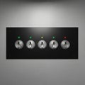 A sleek black control panel features five metal toggle switches. Each switch is Royalty Free Stock Photo