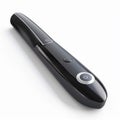 Sleek black electronic remote control with multiple buttons and modern design