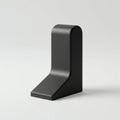 A sleek, black L-shaped object with a smooth surface. Its structure features a flat Royalty Free Stock Photo
