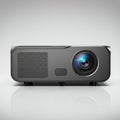 A sleek black projector with a glossy finish sits on a reflective surface. The left side Royalty Free Stock Photo