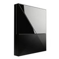 Sleek Black Rectangular Electronic Device with Reflective Geometric Surfaces gadget technology Royalty Free Stock Photo