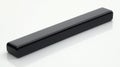 Sleek black rectangular soundbar on white Royalty Free Stock Photo