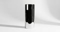 Sleek black and silver cylindrical object Royalty Free Stock Photo