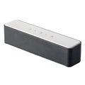 Sleek Black and Silver Rectangular Bluetooth Speaker with White Top audio sound Royalty Free Stock Photo