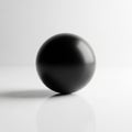 A sleek, black sphere positioned on Royalty Free Stock Photo