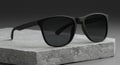 Stylish Black Sunglasses on a Stone Surface Royalty Free Stock Photo