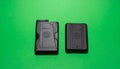 Sleek Black Tech Wallets on Green Screen Royalty Free Stock Photo