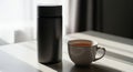 Minimalist Still Life Black Thermos and Cup of Tea Royalty Free Stock Photo