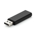 A sleek black USB flash drive with a rectangular shape and a glossy finish. The metal Royalty Free Stock Photo