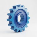 A sleek blue metallic gear with precise teeth and smooth inner bore Royalty Free Stock Photo