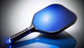 Sleek Blue Pickleball Paddle with Black Grip A Night Studio Shot for Enhanced Performance and Visual Appeal Royalty Free Stock Photo