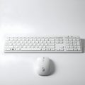AI Generated Image of a White Keyboard and Mouse on a White Surface