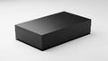 Sleek black rectangular gift box with lid on a white surface present packaging Royalty Free Stock Photo