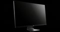 A sleek computer monitor with a glossy black screen and thin bezels, mounted on