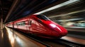 Sleek and futuristic high speed train rushing along the tracks with motion blur effect Royalty Free Stock Photo