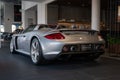 Sleek gray Porsche showcased at a salon