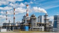Sleek Industrial Powerhouse: Steam Emissions and Modern Engineering Marvel Royalty Free Stock Photo