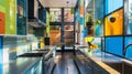 The sleek kitchen in this urban abode is given a lively touch with colorful panels covering the backsplash. Vibrant