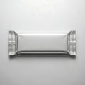 A sleek, metallic foil-wrapped rectangular bar displayed against a neutral background Royalty Free Stock Photo