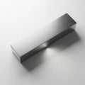 A Sleek Metallic Rectangular Object on a White Background Royalty Free Stock Photo