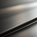 Sleek, metallic surface with a brushed texture and a reflective sheen. Subtle linear Royalty Free Stock Photo