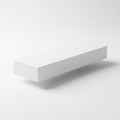 A sleek, minimalist white rectangular object with a subtle shadow Royalty Free Stock Photo