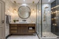 Modern sleek bathroom with marble vanity and shower Royalty Free Stock Photo