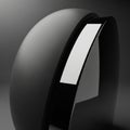 Sleek, modern black object featuring a curved, glossy surface Royalty Free Stock Photo