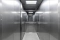 Sleek Steel Elevator Cabin with Mirror Royalty Free Stock Photo