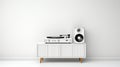 A sleek modern music setup featuring a turntable and speaker on a white cabinet, perfect for the discerning audiophile