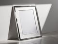 Sleek modern poster frame rectanguler in shape standing on the white wall Royalty Free Stock Photo